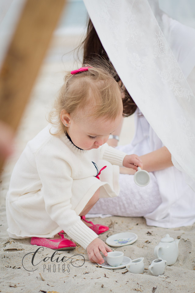 Little girl tea party on the beach