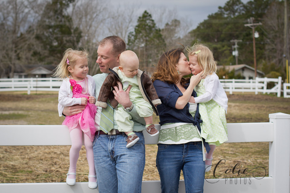 family on fence